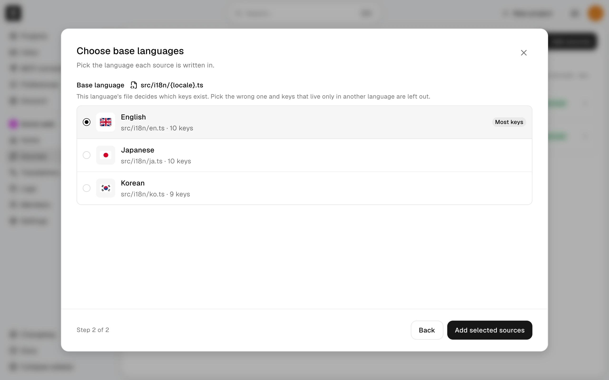 The Choose base languages step of Add sources, with one source's path and its languages as radio options, step 2 of 2, and Back and Add selected sources buttons