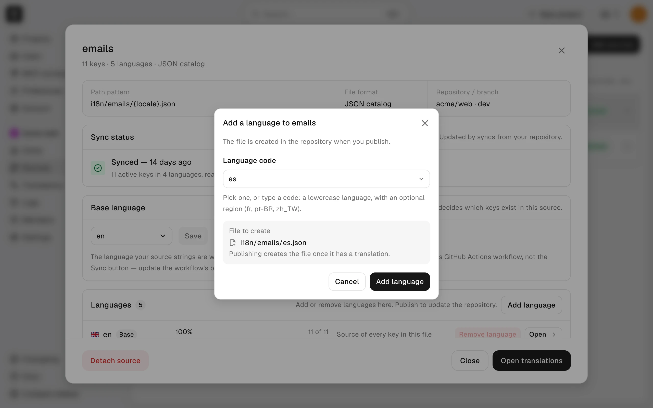 The Add a language dialog over the source details, with es chosen as the language code and i18n/emails/es.json under File to create