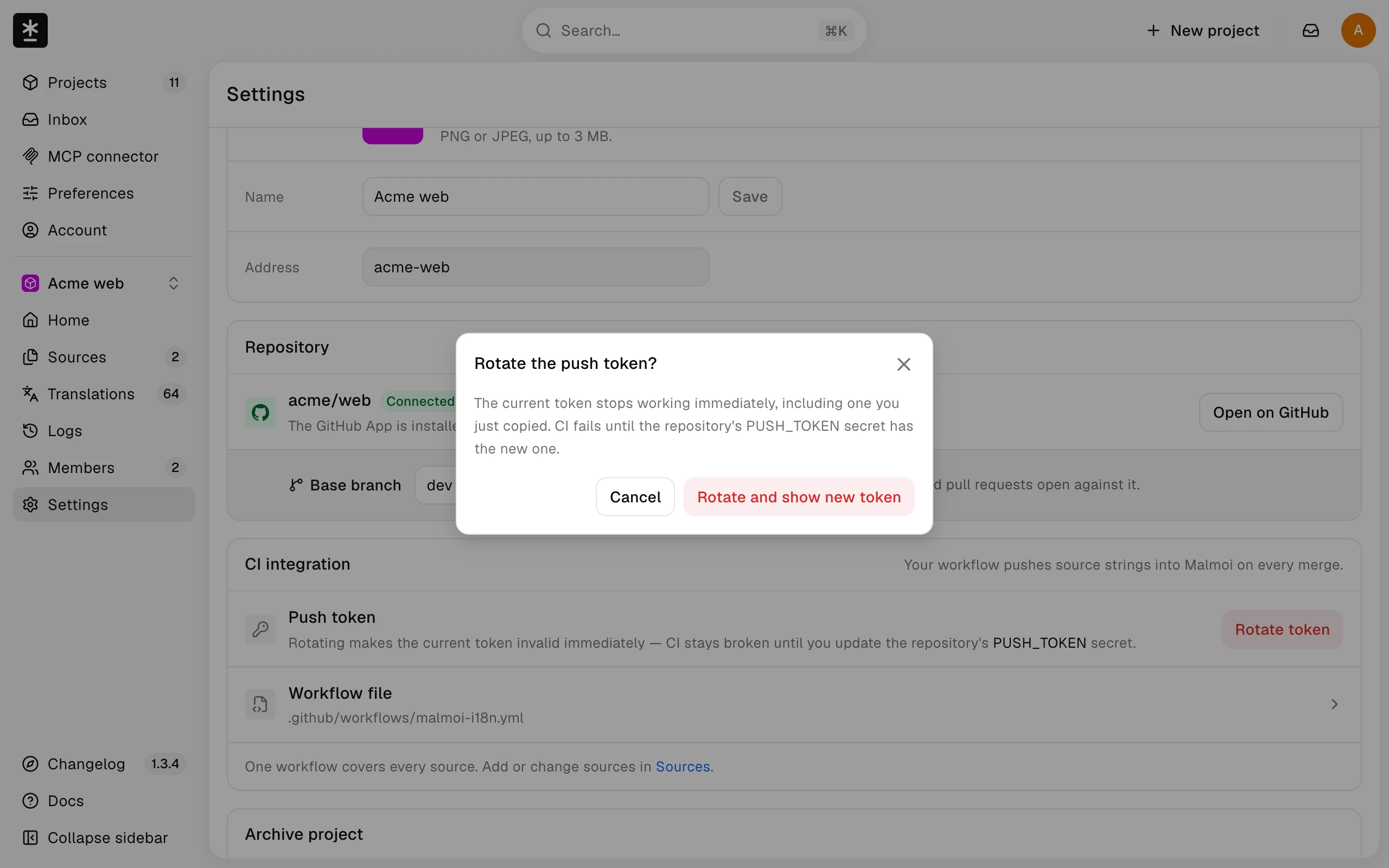 The Rotate the push token dialog in project Settings warning that the current token stops working, with Cancel and Rotate and show new token buttons